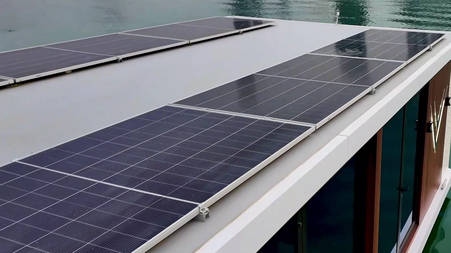 Rows of solar panels across the majlis roof