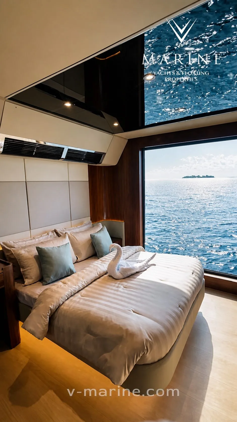 RISE 60 master bedroom with a wide window onto the water
